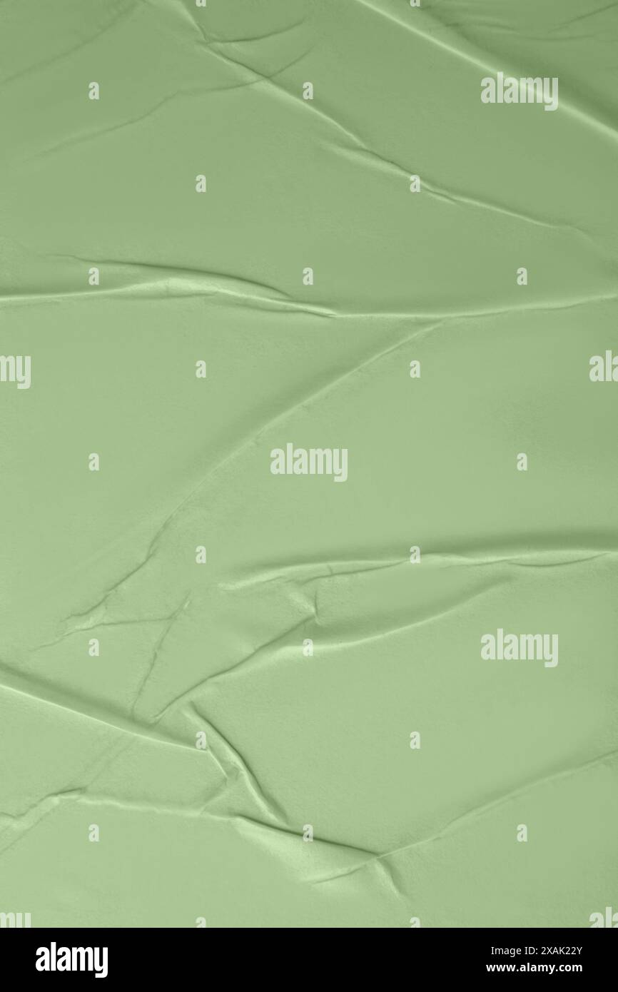 Gerilltes, grünes Papier als Hintergrund, Nahaufnahme Stockfoto