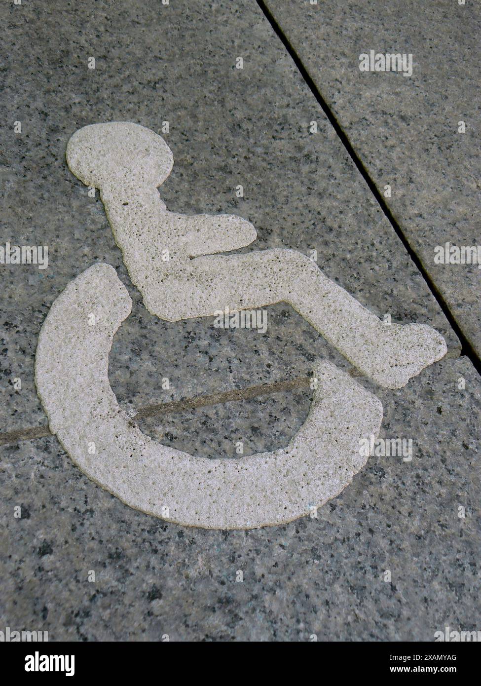 Schilder auf dem Boden für Menschen mit Behinderungen Stockfoto