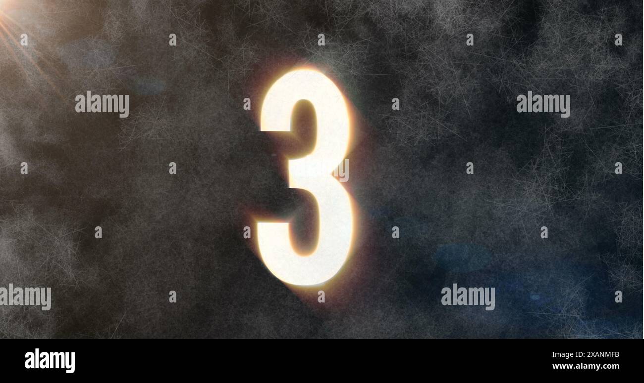 Die große leuchtende Zahl drei steht in der Mitte vor einem dunklen, strukturierten Hintergrund Stockfoto