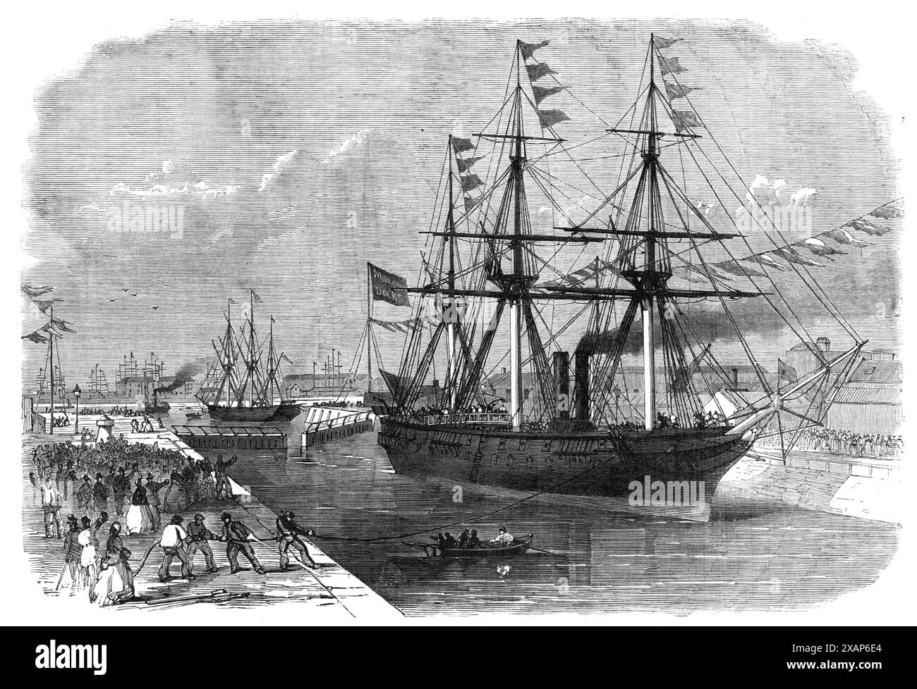 Eröffnung der neuen Docks in Millwall, [London], am Samstag letzten 1868. „Die Schleuse... ist mit 450 m die mit Abstand größte in London. Lang und 80 Fuß Breit. Es gibt drei Paar Schleusentore am Eingang, die es Lastkähnen und kleinen Schiffen ermöglichen, zu jeder Zeit ein- und auszusteigen, während die Wassertiefe von tide...its 28 Fuß beträgt. In der Mitte. Dies ist die größte Wassertiefe, die am Eingang eines jeden Docks in London angebracht ist... in der Umgebung, auf den Kais, befindet sich eine ausgezeichnete Lagerunterkunft, und es wurden Krane errichtet, die von 35 cwt heben können. Auf 15 Tonnen, mit hydraulischer Kraft... Insid Stockfoto