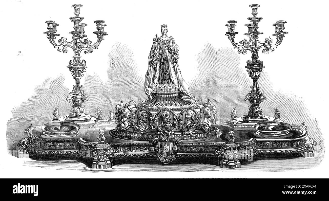 Zeugenaussage an Mr. Henry Brand, M.P., von der Liberalen Partei im Unterhaus, 1868. "Die Präsentation des Zeugnisses, das von den liberalen Mitgliedern des Unterhauses für die Rechte Henry Brand nach seinem Ausscheiden aus dem Amt des Patronage Secretary unterzeichnet wurde, fand letzten Samstagabend bei einem Bankett in Willis's Booms statt. Das Testimonial besteht aus mehreren hübschen Platten. Der Häuptling ist ein Plateau aus Silber, mit halbrunden Enden im Stil von Königin Anne und mit Löwenwappen-Stützen, die ein Herzstück halten, bestehend aus einem runden Sockel, wh Stockfoto
