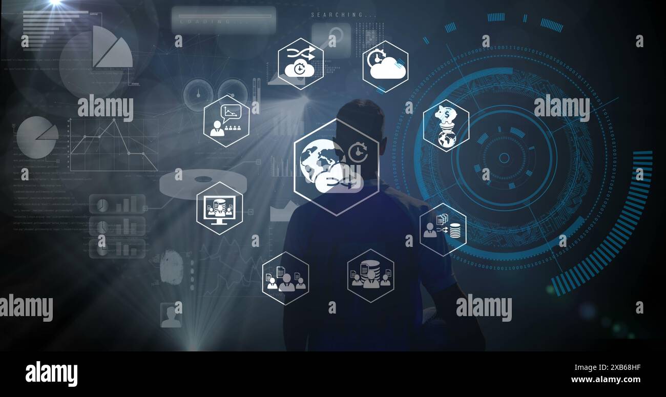Junger kaukasischer Mann, der mit futuristischer digitaler Schnittstelle interagiert Stockfoto