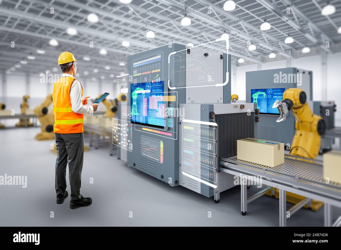 Techniker oder Ingenieure arbeiten mit Roboterarmen im Werk Stockfoto