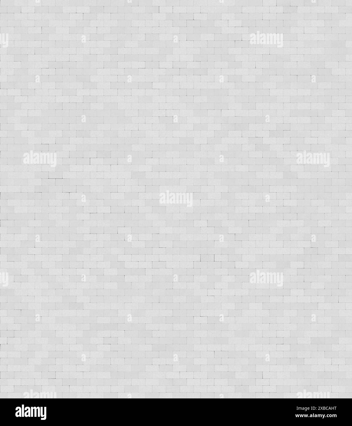 Ein einheitliches Muster aus weißen Ziegeln, die eine raue, strukturierte Wand bilden, Hintergrundbild Stockfoto