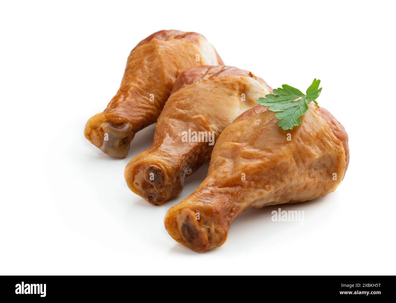 Geräucherte Hähnchenschenkel isoliert auf weißem Hintergrund Stockfoto Geräucherte Hähnchenschenkel isoliert auf weißem Hintergrund Stockfoto