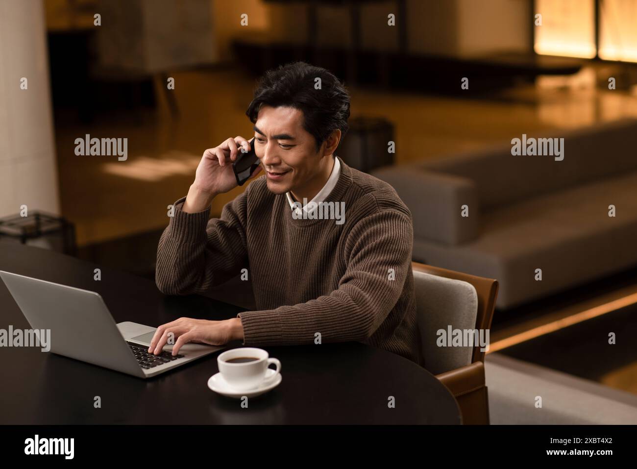Geschäftsmann, Der Von Zu Hause Aus Arbeitet Stockfoto