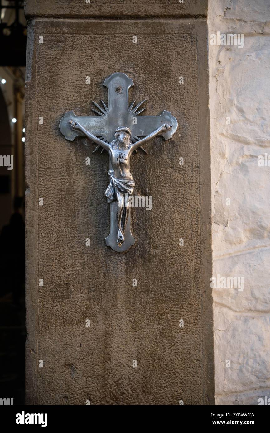 Das Kreuz jesu an der Mauer Stockfoto