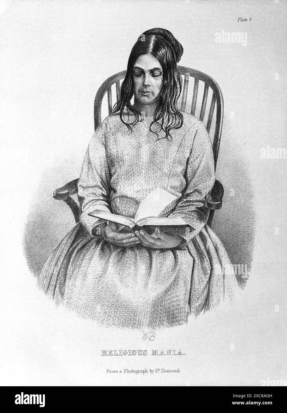 Eine schwarz-weiße Gravur einer jungen Frau, die auf einem Stuhl sitzt und eine Bibel in ihrem Schoß hält. Ihre Augen sind geschlossen, und ihr Ausdruck ist ein tiefer Gedanke. Die Gravur ist mit religiöser Manie betitelt. Es ist eine Darstellung eines Patienten, der an religiöser Manie leidet, wie in der Medical Times Gazette dargestellt. Stockfoto