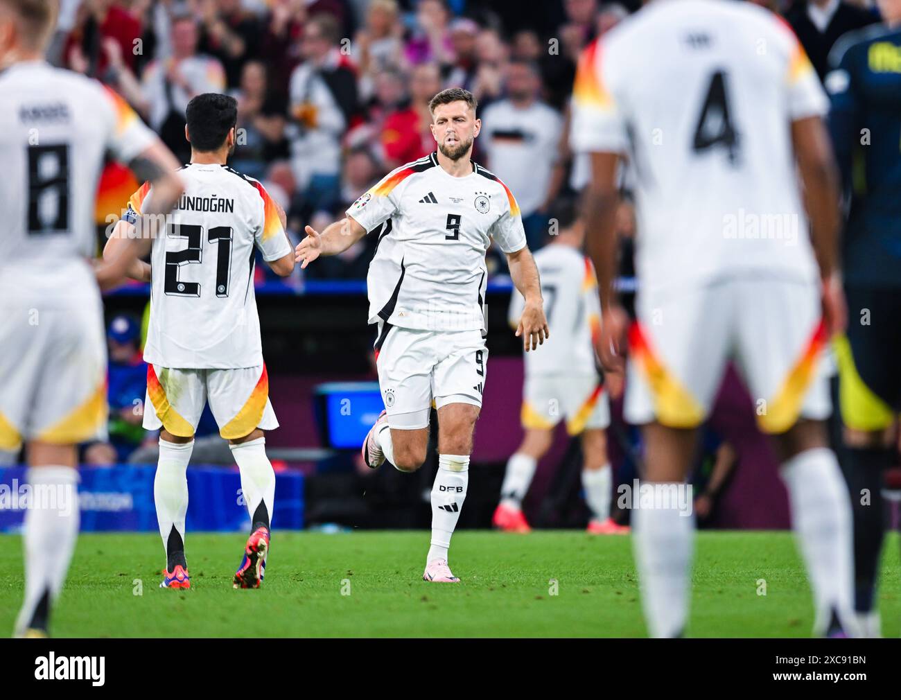 Niclas Fuellkrug Germany rennt nach seiner Einwechslung auf das Feld, UEFA EURO 2024 - Gruppe A, Deutschland gegen Schottland, Fussball Arena München am 14. Juni 2024 in München, Deutschland. Foto von Silas Schueller/DeFodi Images Niclas Fuellkrug Deutschland tritt am 14. Juni 2024 in München ein, UEFA EURO 2024 - Gruppe A, Deutschland gegen Schottland, München Football Arena. Foto: Silas Schueller/DeFodi Images Defodi-738 738 GERSCO 20240614 421 *** Niclas Fuellkrug Deutschland läuft nach seiner Ersetzung auf das Feld, UEFA EURO 2024 Gruppe A, Deutschland gegen Schottland, München Football Arena am 14. Juni 202 Stockfoto