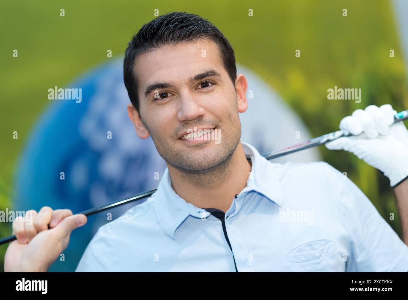 Männliche Golfspieler posieren Stockfoto