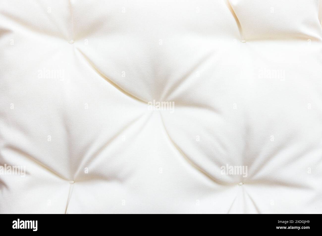 Weißer Stoff, Nahaufnahme und Details, modischer Hintergrund oder Hintergrund. Stockfoto