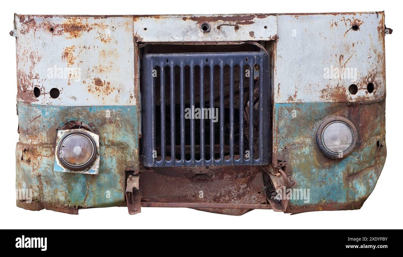 Kaputte Glasscheinwerfer ein Radiato auf dem rostigen Eisen eines blauen Vinatge-Busses isoliert Stockfoto