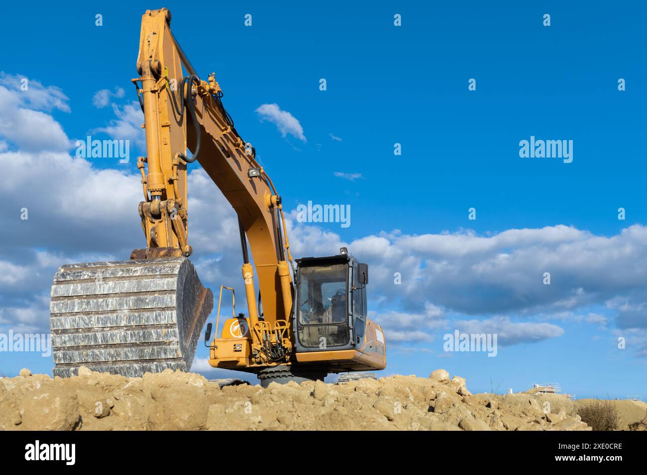 Bagger auf der Baustelle tätig Stockfoto