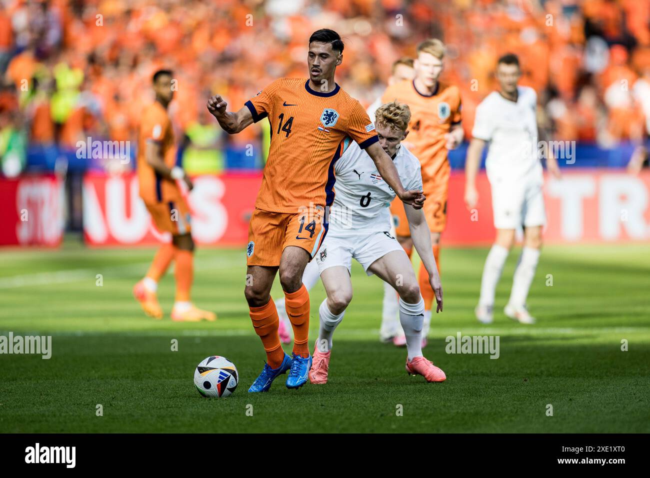 Berlin, Deutschland. Juni 2024. Tijjani Reijnders (14) aus den Niederlanden beim Spiel der UEFA Euro 2024 in der Gruppe D zwischen den Niederlanden und Österreich im Olympiastadion in Berlin Credit: Gonzales Photo/Alamy Live News Stockfoto