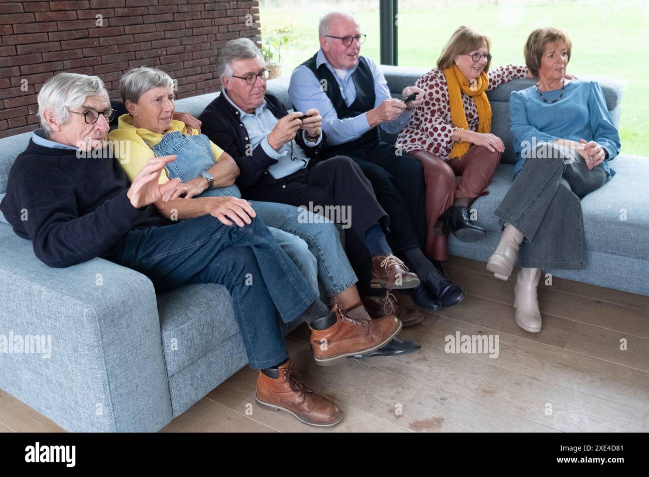 Engagierte Senioren: Spielzeit zu Hause Stockfoto