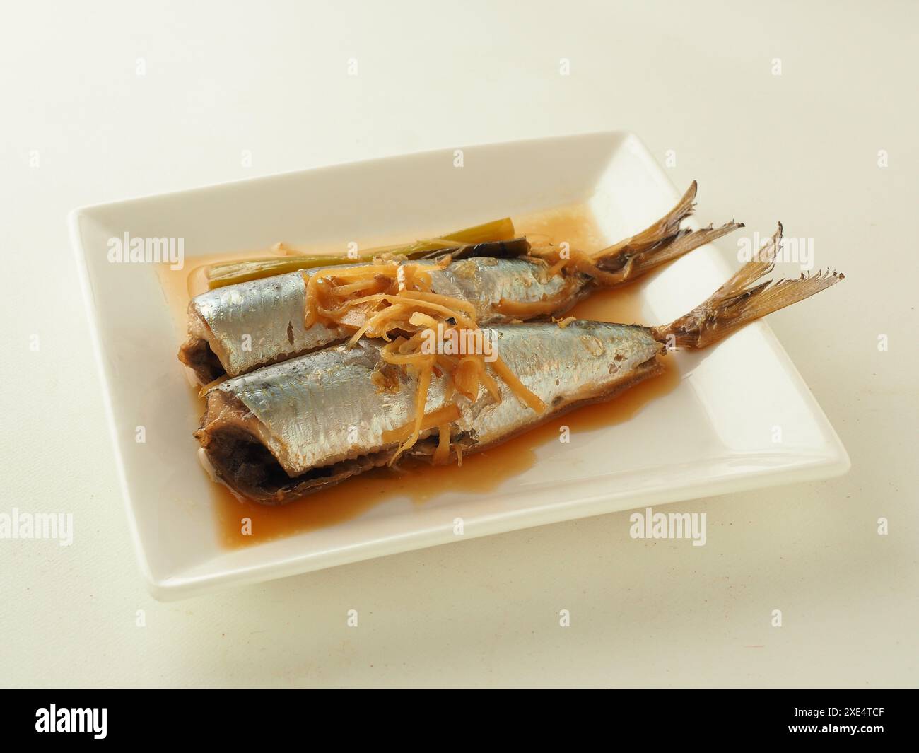 Sardine mit Ingwer gekocht Stockfoto