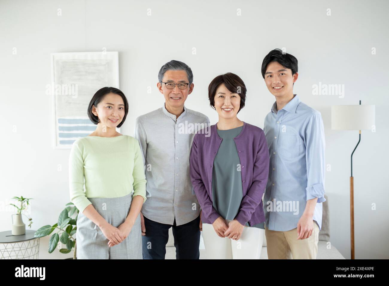 Familie von zwei Generationen lächelnd Stockfoto