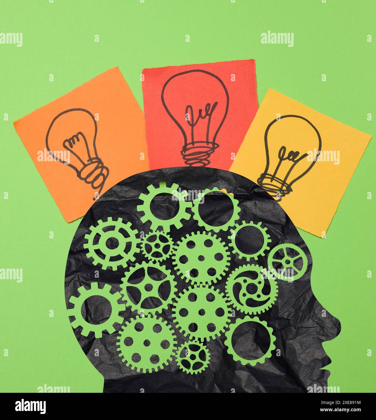 Silhouetten eines männlichen Kopfaufklebers mit gezogenen elektrischen Lampen Stockfoto