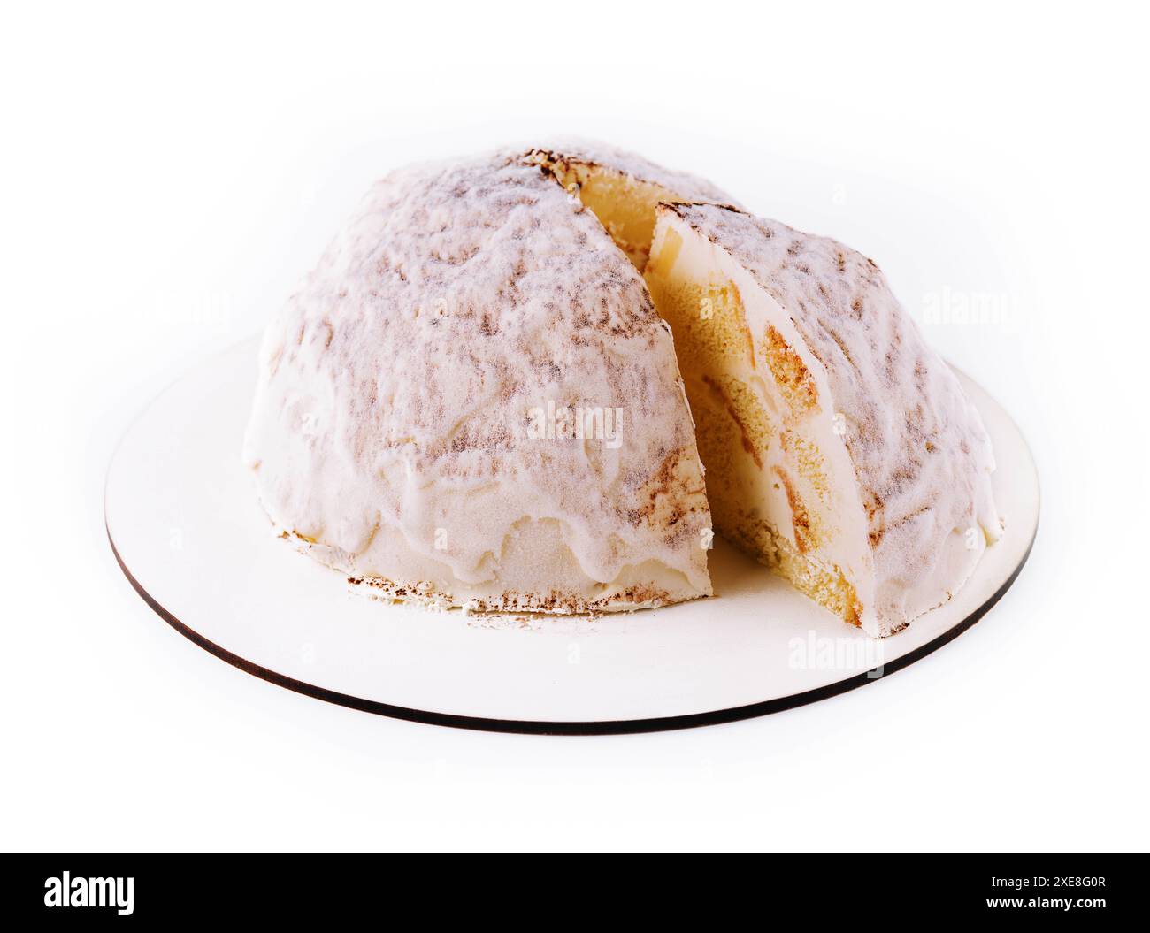 Weißer Mousse-Kuchen auf weißem Teller Stockfoto