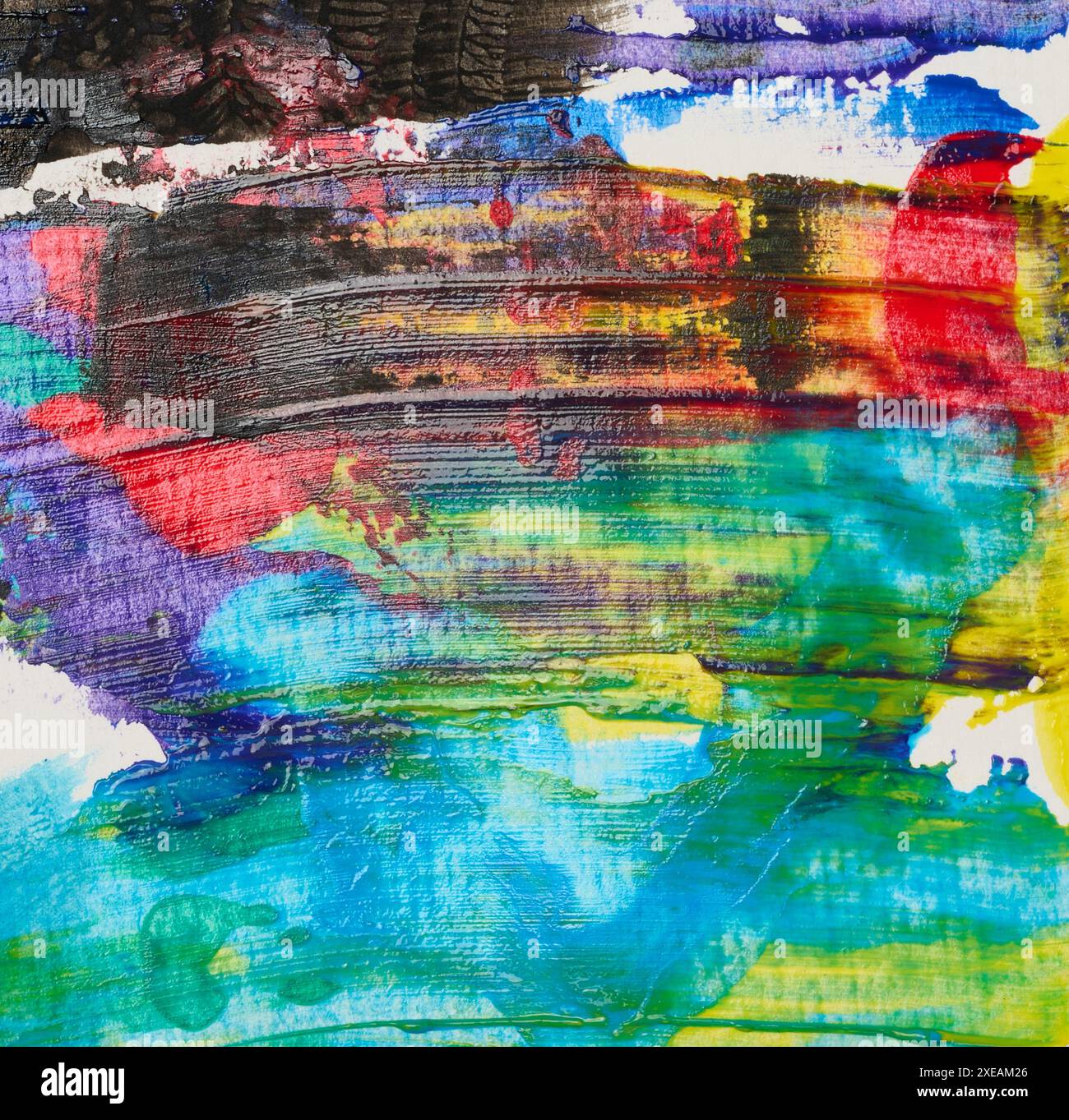 Mehrfarbige Ölfarbe auf einem weißen Blatt Papier Stockfoto