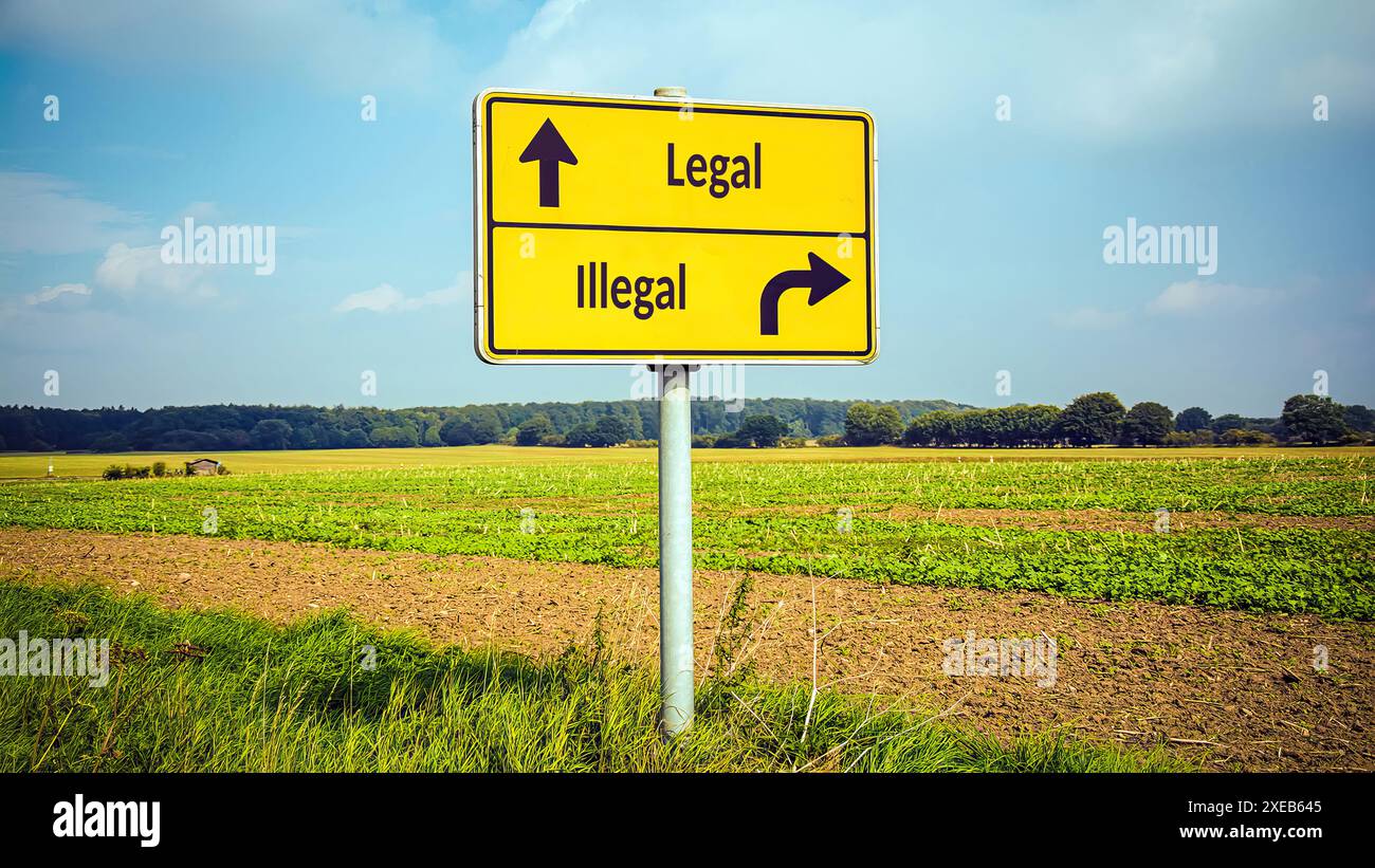 Wegweiser auf direktem Weg zu legal versus illegal Stockfoto