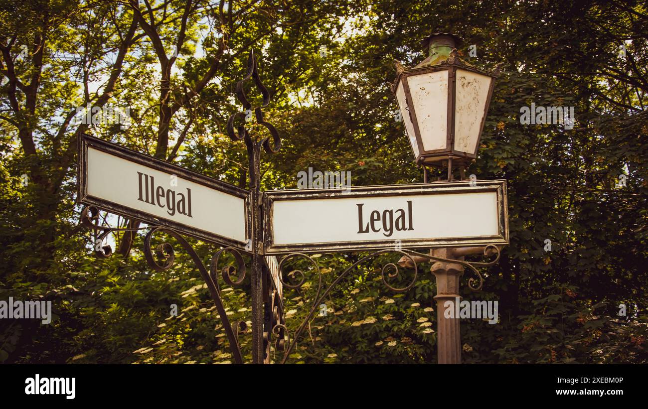 Wegweiser auf direktem Weg zu legal versus illegal Stockfoto