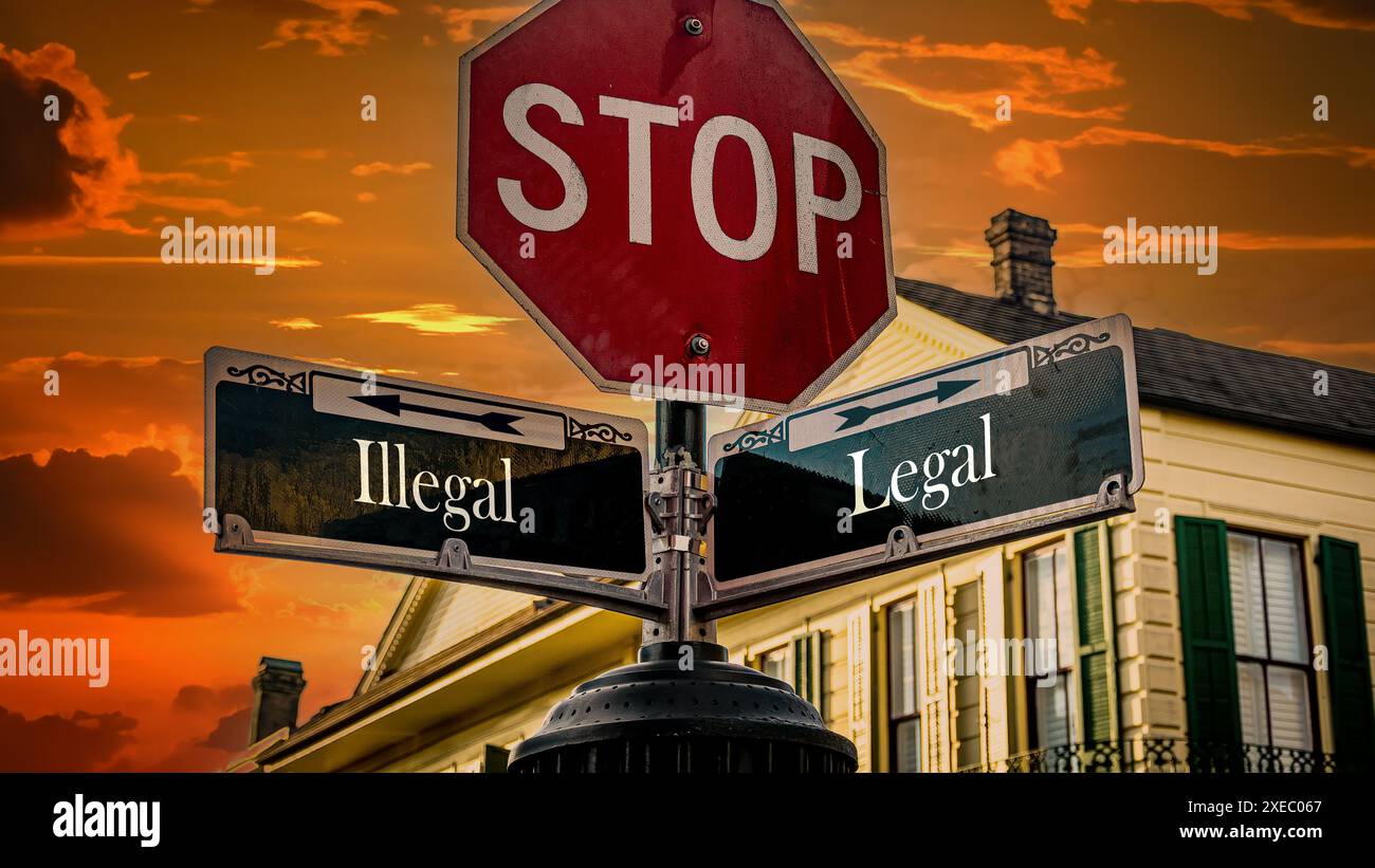 Wegweiser auf direktem Weg zu legal versus illegal Stockfoto
