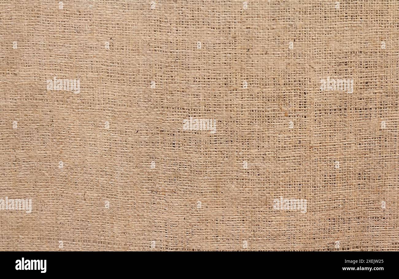 Sehr grobes, raues Gewebe aus Flachs, Jute oder Hanf. Hintergründe und Texturen Stockfoto