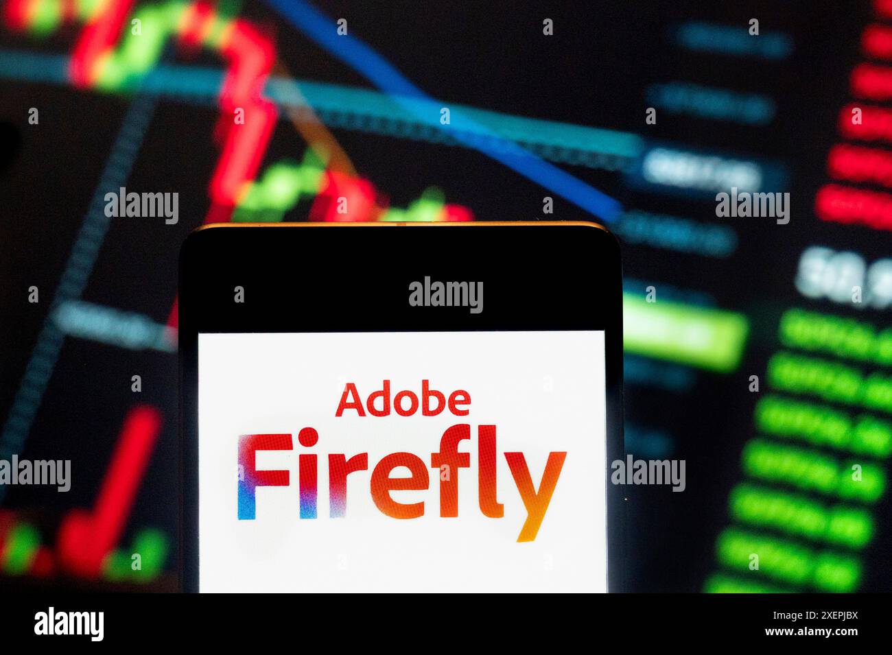 China. Juni 2024. In dieser Fotoabbildung wird das in Adobe Creative Cloud enthaltene generative Modell für maschinelles Lernen, Adobe Firefly, auf einem Smartphone mit einem wirtschaftlichen Börsenindex-Diagramm im Hintergrund angezeigt. (Credit Image: © Budrul Chukrut/SOPA Images via ZUMA Press Wire) NUR REDAKTIONELLE VERWENDUNG! Nicht für kommerzielle ZWECKE! Stockfoto