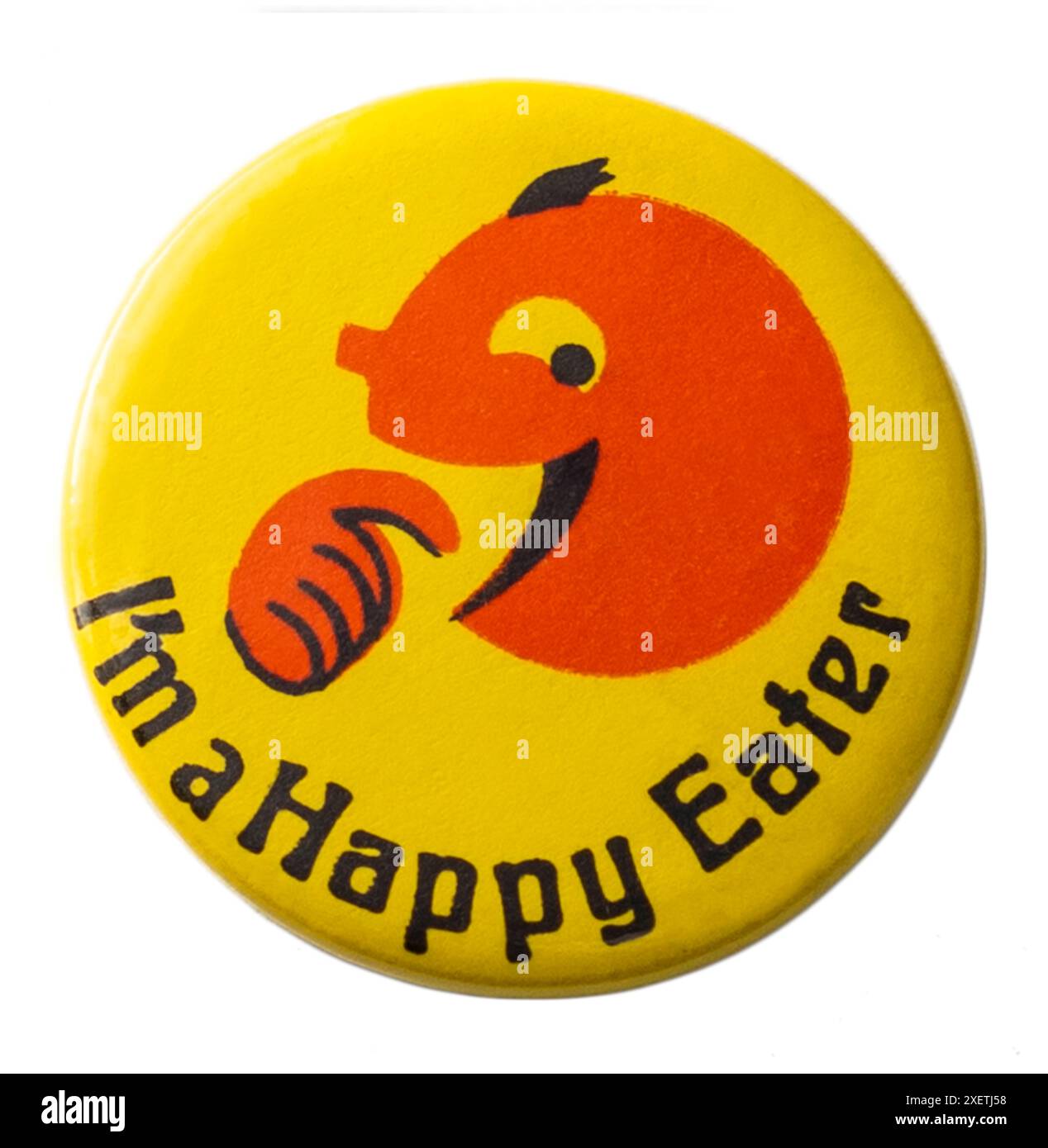 „I’m a Happy Eater“ Vintage 1980er Jahre Pin-Emblem an junge Happy Eater, die es geschafft haben, ihren Teller zu räumen! The Happy Eater war eine 1973 gegründete Kette von Restaurants am Straßenrand in Großbritannien, die 1986 75 Restaurants an Einer Straße hatte. Stockfoto