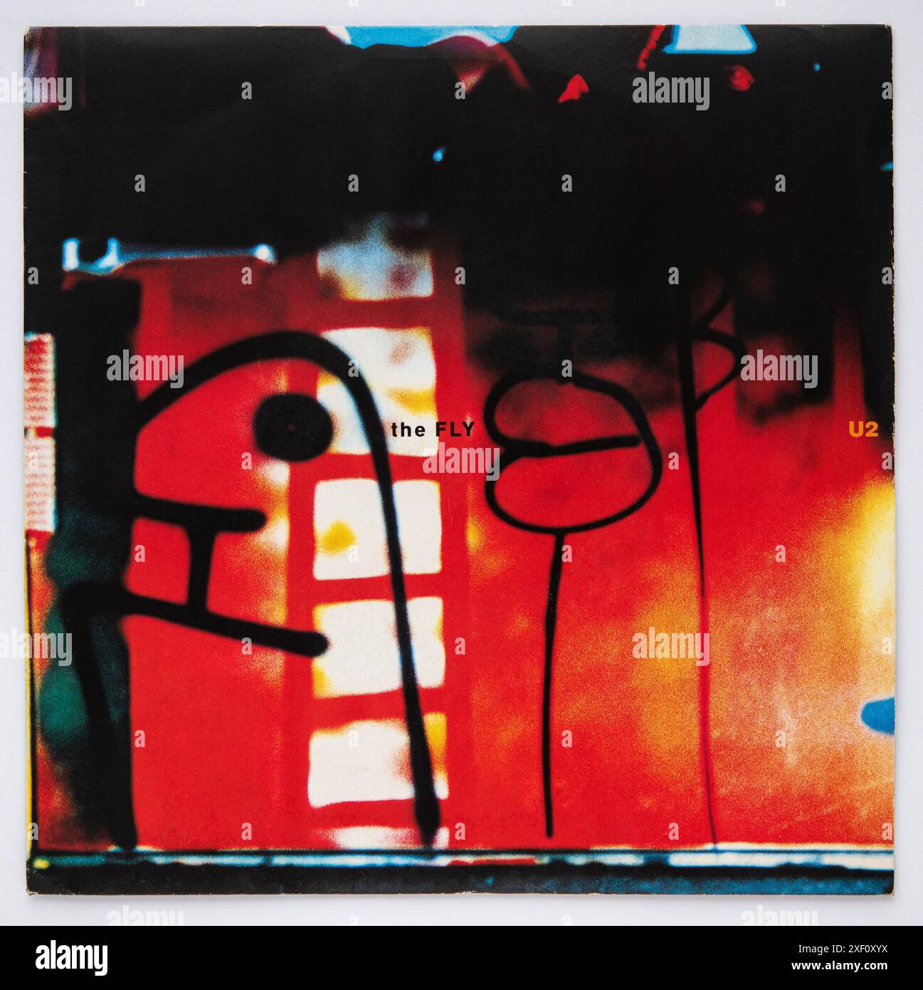 Bildcover der Sieben-Inch-Single-Version von The Fly von U2, die 1991 veröffentlicht wurde Stockfoto