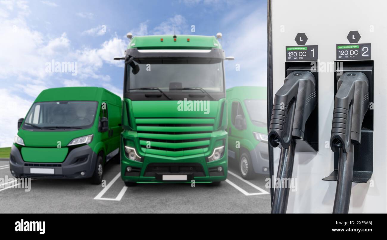 Ladestation für Elektrofahrzeuge auf einem Hintergrund von LKW und Transportern. Umweltfreundliches Flottenkonzept. Stockfoto