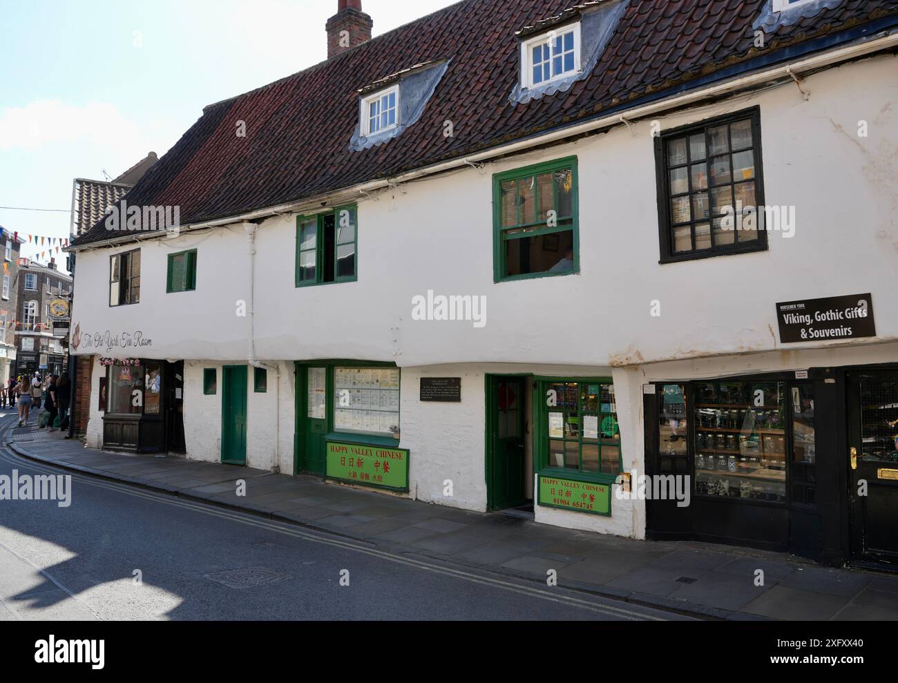 Die älteste noch erhaltene Reihe von Häusern in York wurde 1316 auf Goodramgate erbaut. Stockfoto Die älteste noch erhaltene Reihe von Häusern in York wurde 1316 auf Goodramgate erbaut. Stockfoto