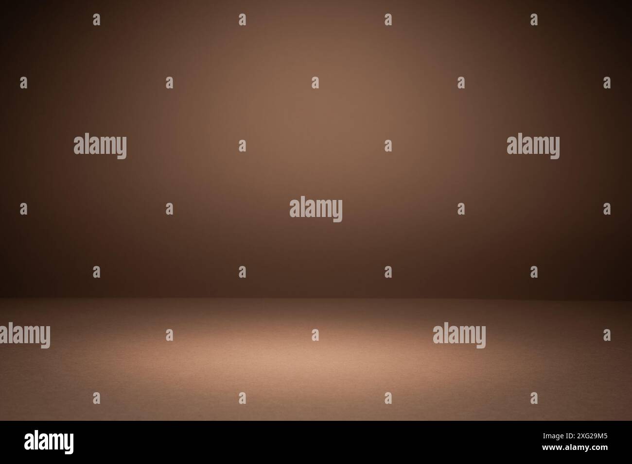 Brauner Gradient Studio-Hintergrund Mit Licht Stockfoto