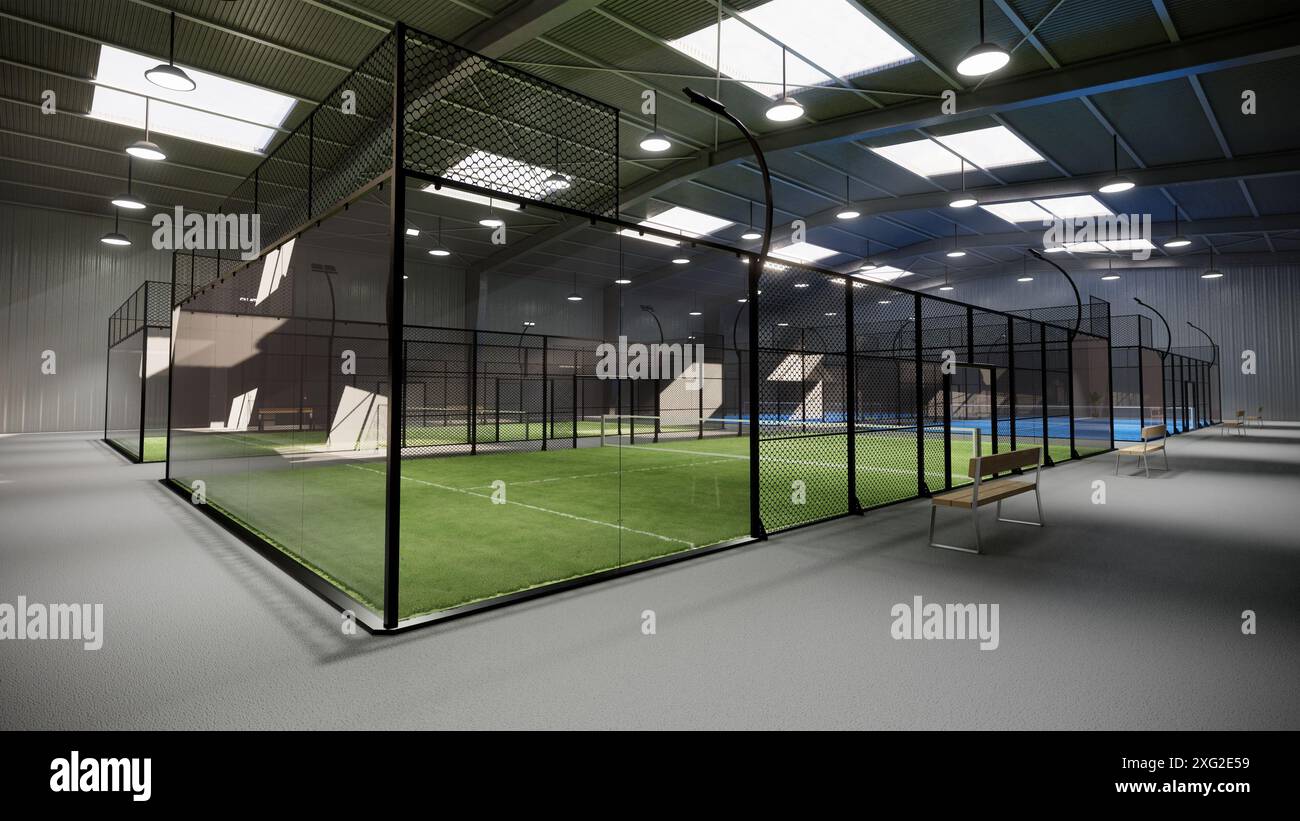 Leere grüne und blaue Padel-Tennisplätze in einem Lagergebäude. Im Sportkomplex gelegen. Wenn die Lichter tagsüber eingeschaltet sind Stockfoto