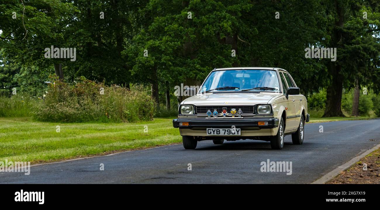 East Lothian, Schottland, Großbritannien, 7. Juli 2024. Räder der Vergangenheit: Die schottische Vereinigung der Fahrzeugliebhaber führt die Besitzer von Oldtimern durch die Landschaft zum malerischen Gelände von Lennoxlove. Im Bild: Ein Triumph von 1988. Quelle: Sally Anderson/Alamy Live News Stockfoto