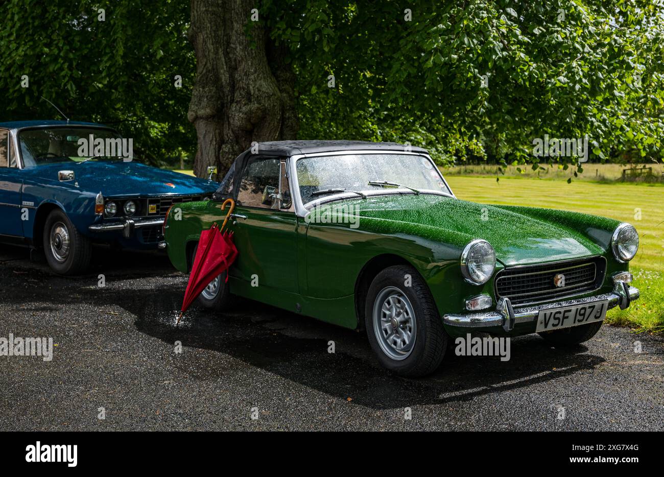 East Lothian, Schottland, Großbritannien, 7. Juli 2024. Räder der Vergangenheit: Die schottische Vereinigung der Fahrzeugliebhaber führt die Besitzer von Oldtimern durch die Landschaft zum malerischen Gelände von Lennoxlove. Im Bild: Ein 1971 MG Zwerg. Quelle: Sally Anderson/Alamy Live News Stockfoto