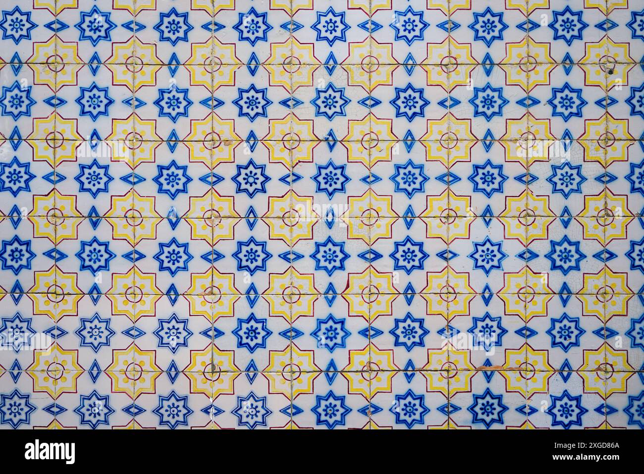 Musterbild von blauen und gelben traditionellen portugiesischen dekorativen Fliesen Azulejos Stockfoto