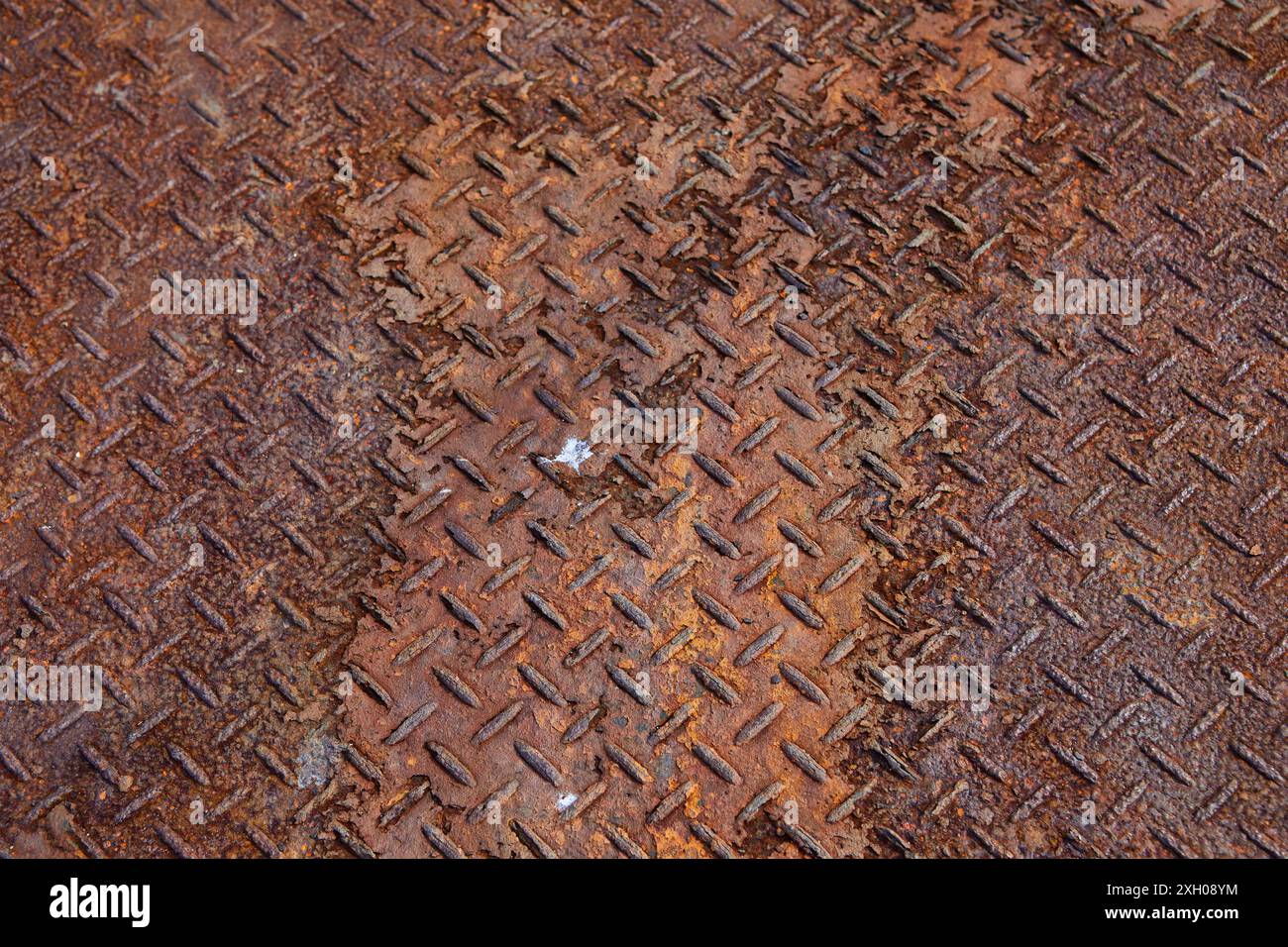 Strukturiertes Stahlblech mit starkem Rost Stockfoto