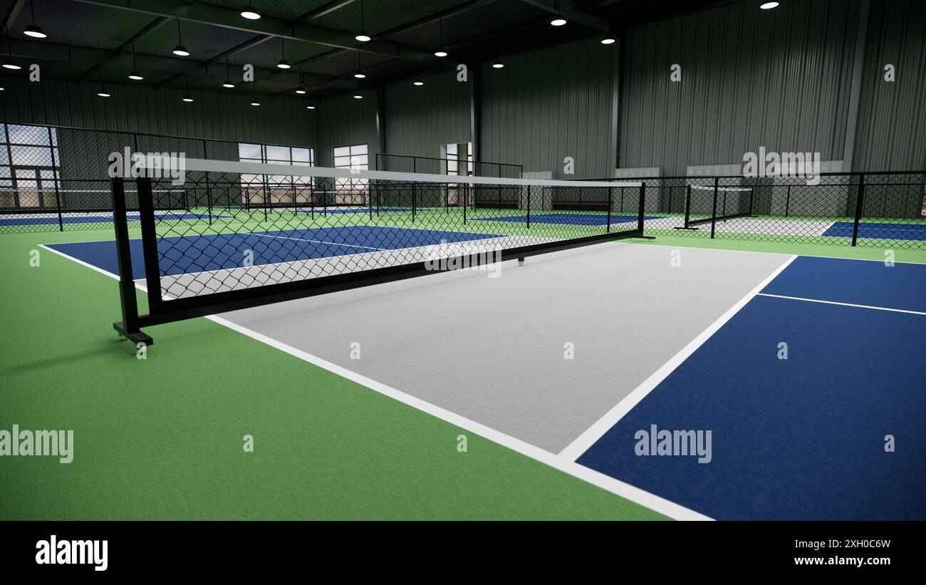 Ein Tennisplatz mit einer blauen, grünen und grauen Oberfläche Stockfoto