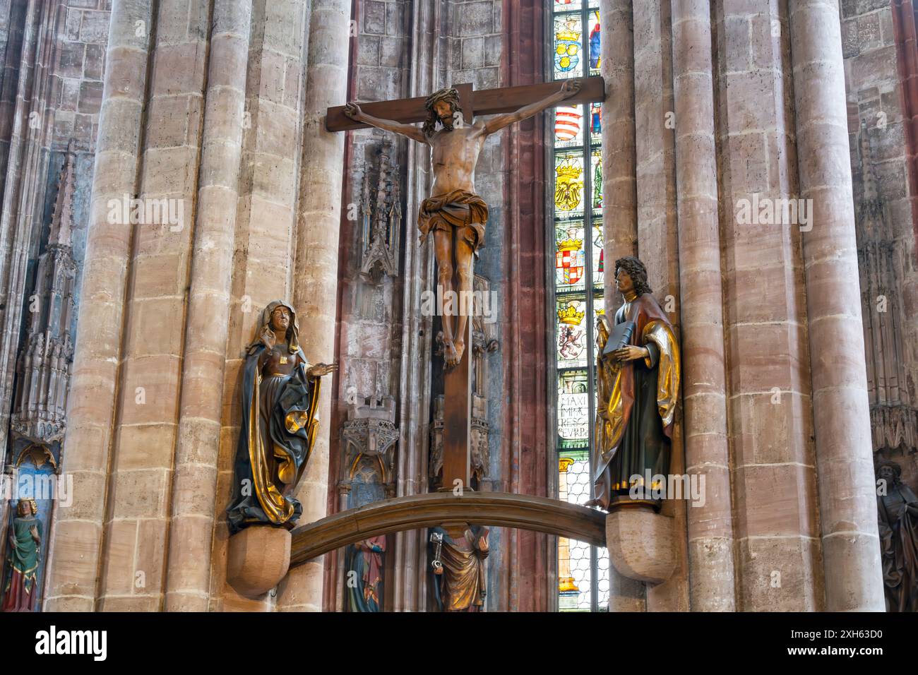Berühmtes Kruzifix von Veit Stoß (Veit Stoss), Wickel Kruzifix, 1520, mit der Jungfrau und dem Heiligen Johannes, 1506/8. St. Sebaldus Kirche, Nürnberg, Deutschland. Stockfoto