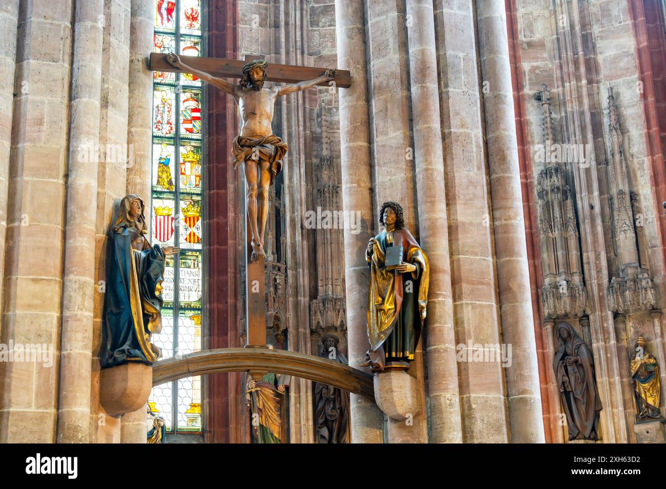Berühmtes Kruzifix von Veit Stoß (Veit Stoss), Wickel Kruzifix, 1520, mit der Jungfrau und dem Heiligen Johannes, 1506/8. St. Sebaldus Kirche, Nürnberg, Deutschland. Stockfoto