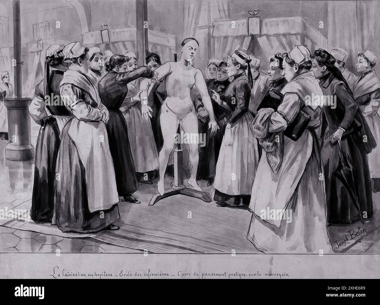 Eine Gruppe von Krankenschwestern in Uniformen steht in einer französischen Krankenhausstation und hört aufmerksam zu, wie eine Krankenschwester demonstriert, wie man eine Schaufensterpuppe verband. Die Schaufensterpuppe befindet sich auf einem Stand in der Mitte des Raumes, umgeben von den Schwestern. Datum: c. 1927. Stockfoto