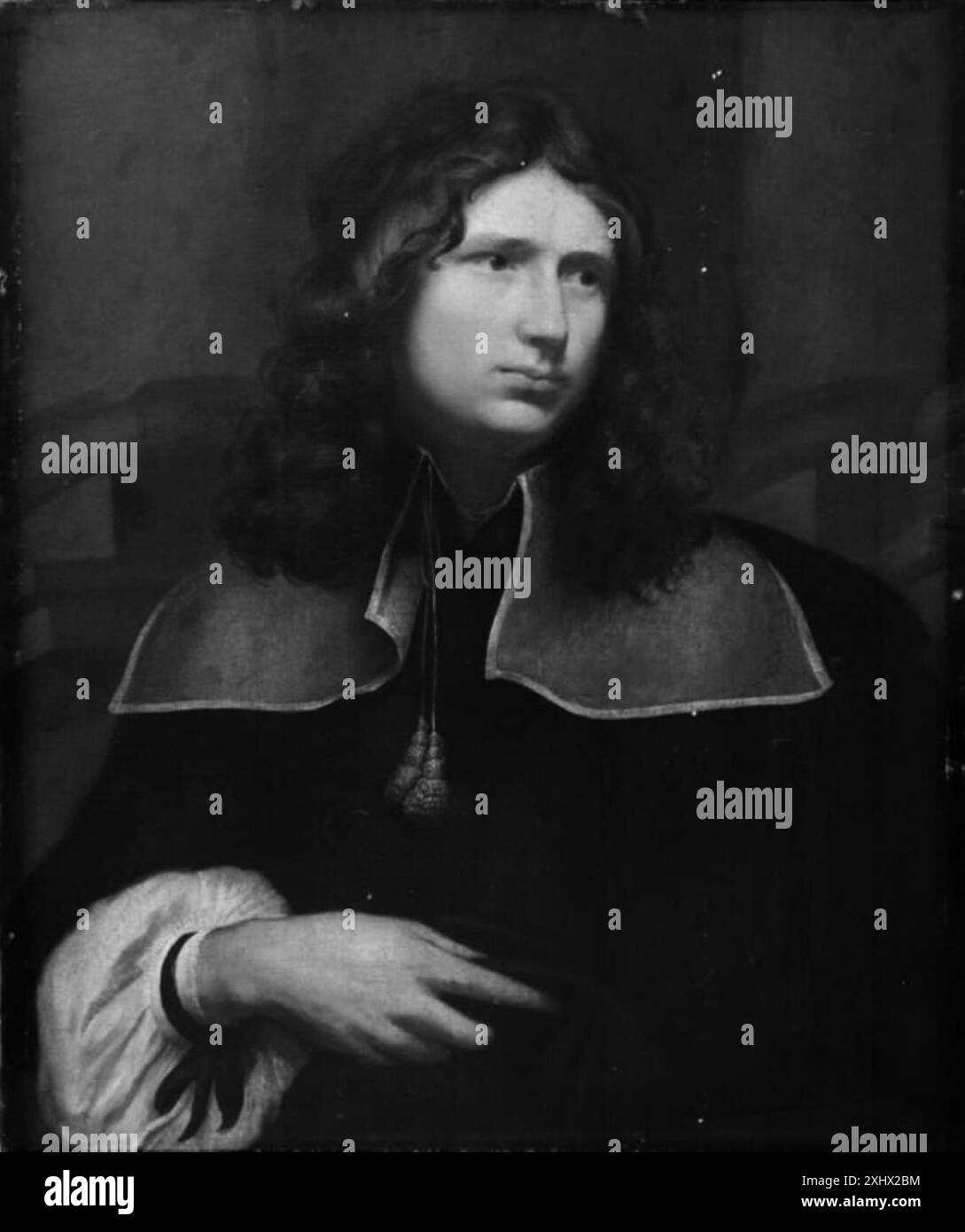 Ein flämisches Gemälde eines jungen Mannes von Peter Franchoys und Anthony van Dyck, das Porträttechniken, Kleidung und Gesichtsausdruck des 17. Jahrhunderts in einer formalen Komposition hervorhebt. Stockfoto