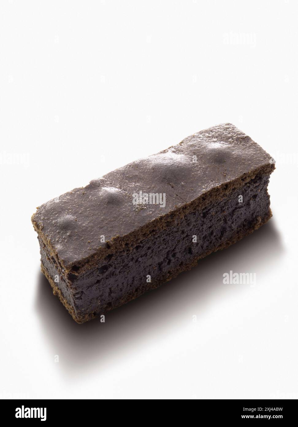 Portion Schokoladenkuchen Stockfoto