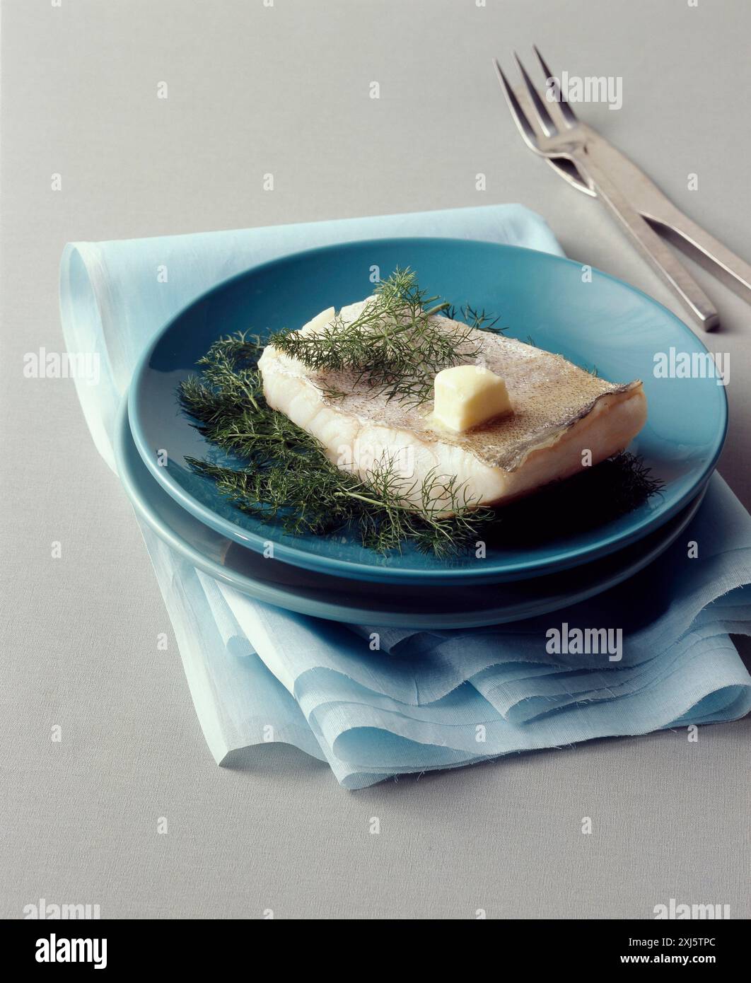 Dampfgekochter Pollack mit Dill Stockfoto