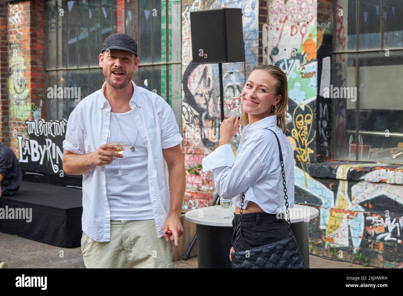 Frederic Heidorn und Sina Tkotsch - Tim Burton s Labyrinth - Berlin Premiere der Ausstellung in der Radsetzerei auf dem RAW-Gelaende in Berlin am 19.07.2024. Tim Burtons Labyrinth - Berlin Premiere *** Frederic Heidorn und Sina Tkotsch Tim Burtons Labyrinth Berlin Premiere der Ausstellung in der Radsetzerei in der RAW Gelaende in Berlin am 19 07 2024 Tim Burtons Labyrinth Berlin Premiere Stockfoto