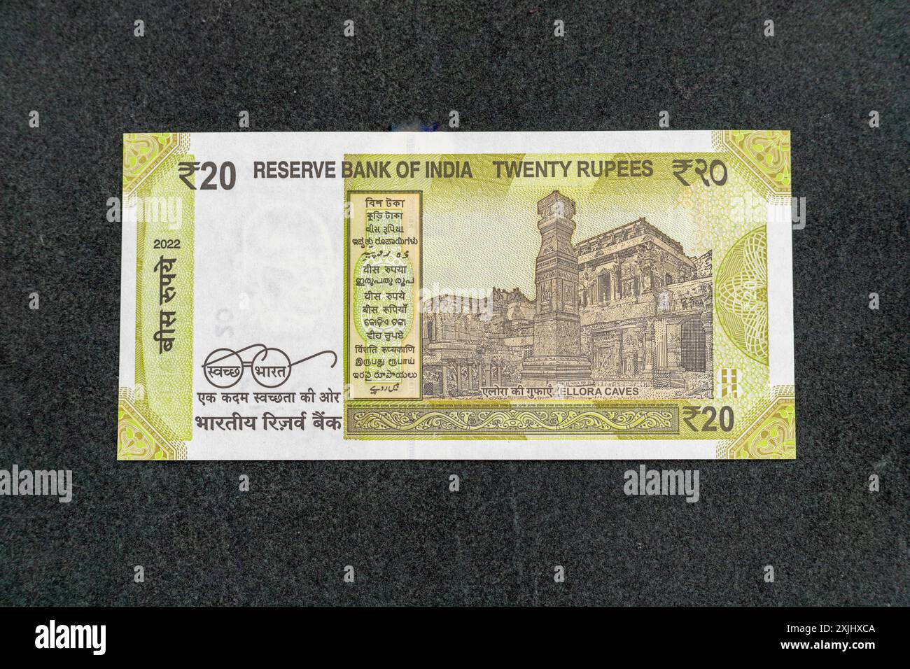 Indische neue 20 Rupien Währungsnote auf der Rückseite mit dem Motiv der Ellora Caves auf der Rückseite, das das kulturelle Erbe des Landes darstellt Stockfoto