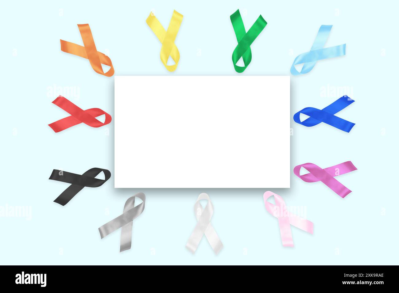 Bunte Farbbänder mit Platz für Text auf blauem Hintergrund. World Cancer Day Concept, 4. Februar. Gesundheitswesen und Medizinkonzept. Stockfoto