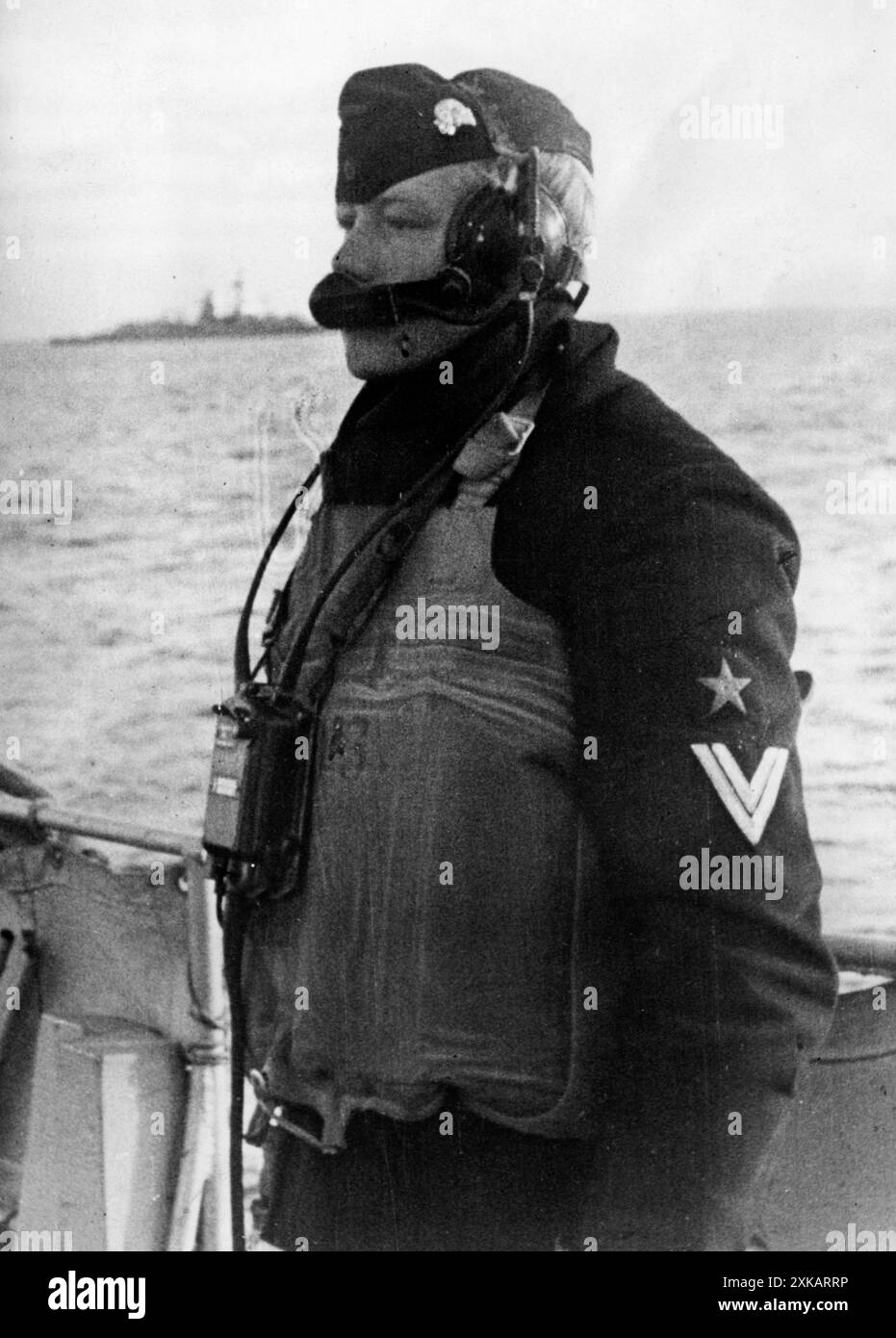 Ein Seemann in Wache auf einem deutschen Torpedoboot in Norwegen. Foto: Schörpf. [Automatisierte Übersetzung] Stockfoto